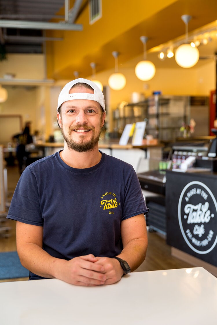 headshot of chef andrew gravens of A Place at the Table